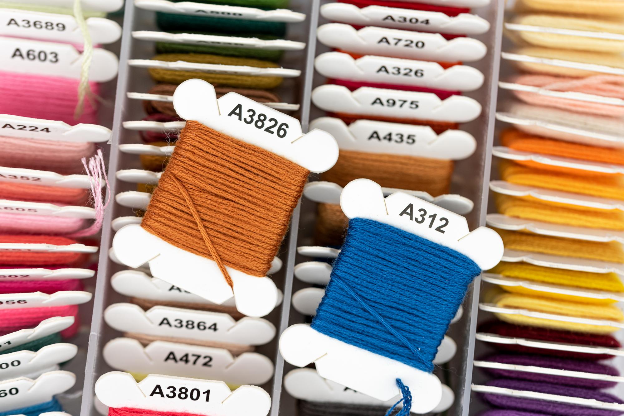 stack of embroidered samples